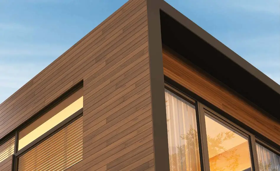 Modern house with sleek exterior cladding on walls, offering both style and protection — by Cladding Wellington.