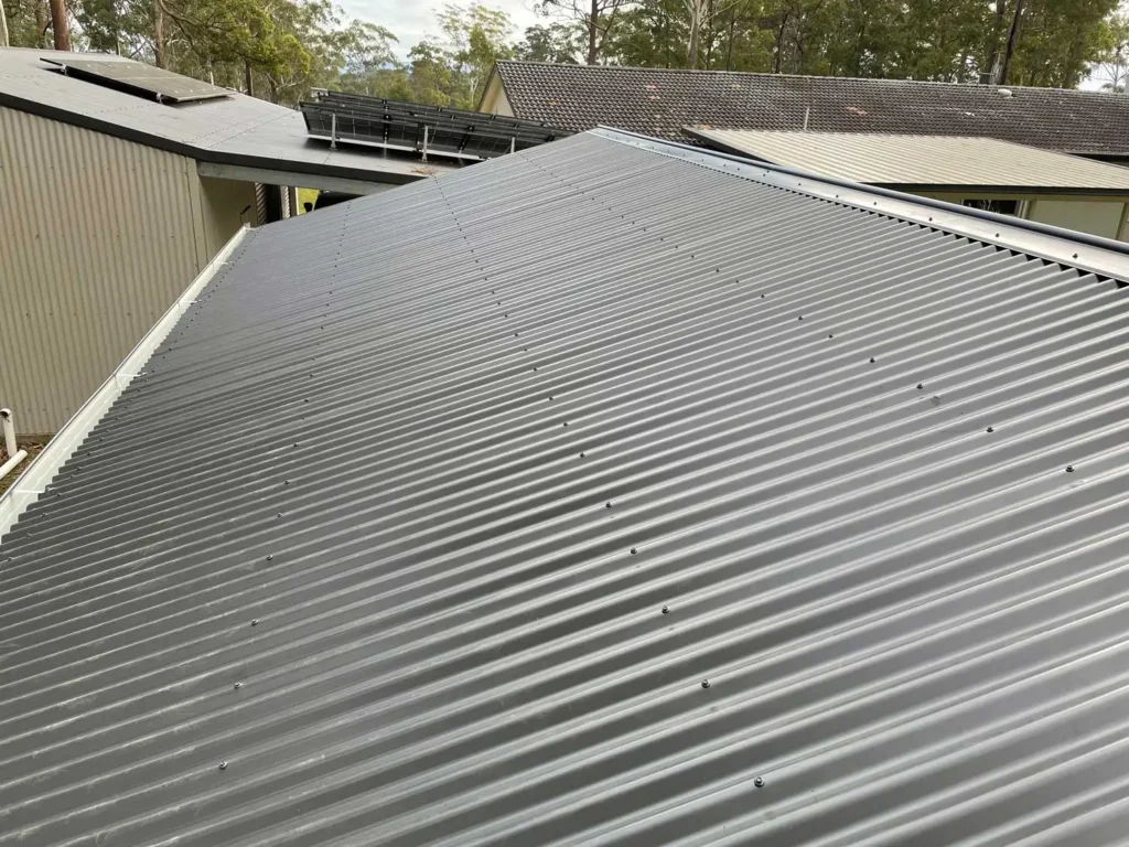 Roof recladding completed, showcasing a clean and weather-resistant finish — by Cladding Wellington.